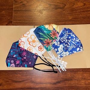 Women’s four pack of cotton layered face masks floral print all brand new!